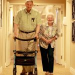 Empire Crossing Retirement Community residents ?John Holmn and his wife Audrey McGilvary walk down the hall for lunch.
Media got a sneak peak at Empire Crossing Retirement Community at the corner of Rose Glenn Road and Ward Street on Thursday June 18, 2015 in Port Hope, Ont. 
There are 64 of the largest one and two bedroom suites in the industry available.
The facility has a fully equipped state-of-the-art sprinkler system and all residents use a twenty-four hour wearable emergency response system ensuring the fastest response time possible when urgest care is needed.
This is Nautical Lands Group's 19th facility across Ontario and the motto is, "the home of the underaged senior."
Pete Fisher/Northumberland Today/Postmedia Network